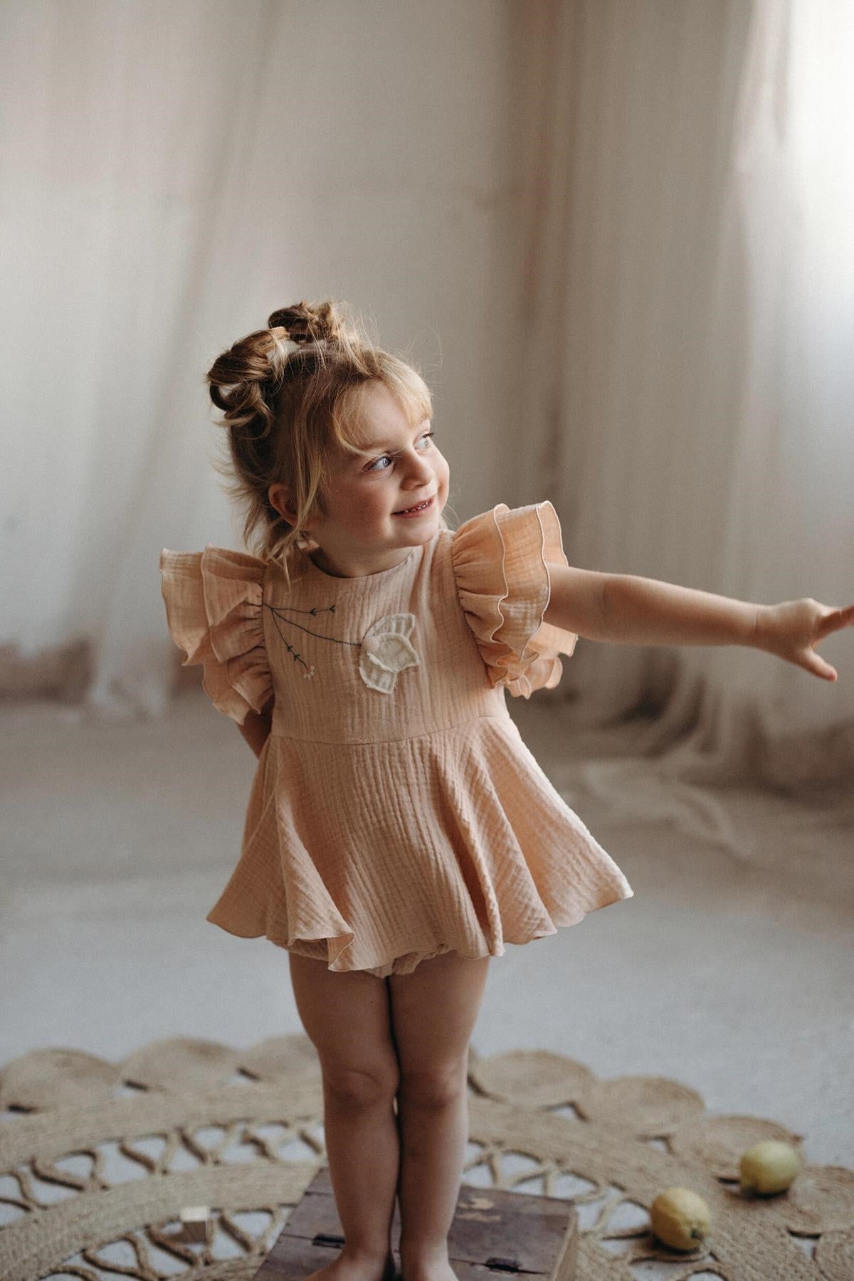 Organic pink romper suit with cape-style skirt-Popelin
