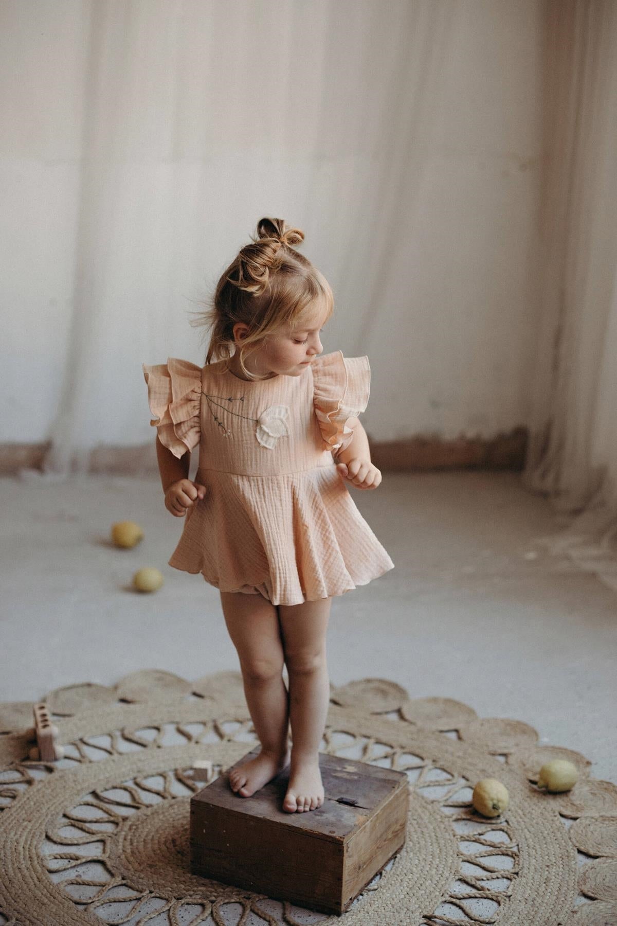 Organic pink romper suit with cape-style skirt-Popelin